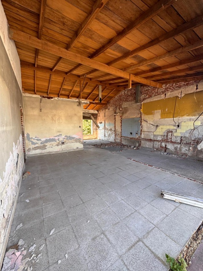 LOTE CON CONSTRUCCION EN LOS TRONCOS. FINANCIA.